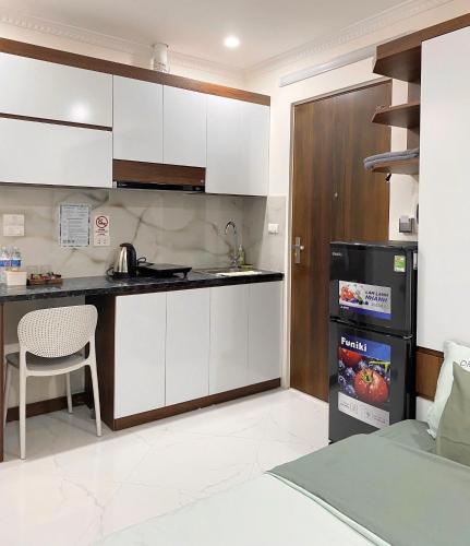 Η κουζίνα ή μικρή κουζίνα στο Hera West Lake Apartment