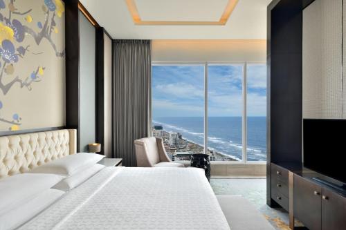 Postel nebo postele na pokoji v ubytování Sheraton Colombo Hotel