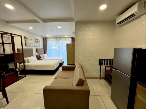 Postel nebo postele na pokoji v ubytování Timurbay Residences