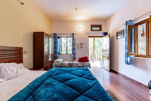 Postel nebo postele na pokoji v ubytování The Corbett Rajae Homestay