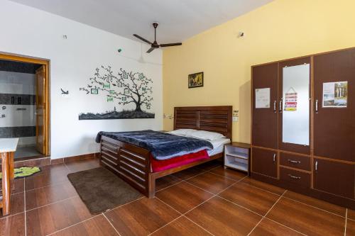 Postel nebo postele na pokoji v ubytování The Corbett Rajae Homestay