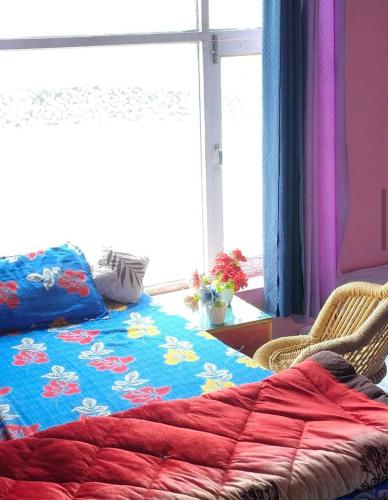 Ένα ή περισσότερα κρεβάτια σε δωμάτιο στο Ladon home stay