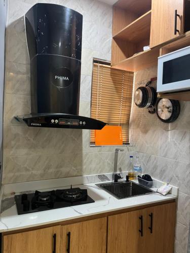 Una cocina o cocineta en Home away from