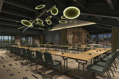 a large conference room with a long table and chairs at The Westin Istanbul Nisantasi in Istanbul