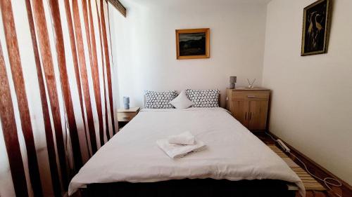 En eller flere senge i et værelse på Belvedere Cozla