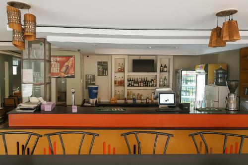 Ο χώρος του lounge ή του μπαρ στο THE ICE GARDENs GUESTHOUSE - Kigali