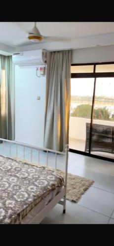 Ένα ή περισσότερα κρεβάτια σε δωμάτιο στο Tudor Nora apartments
