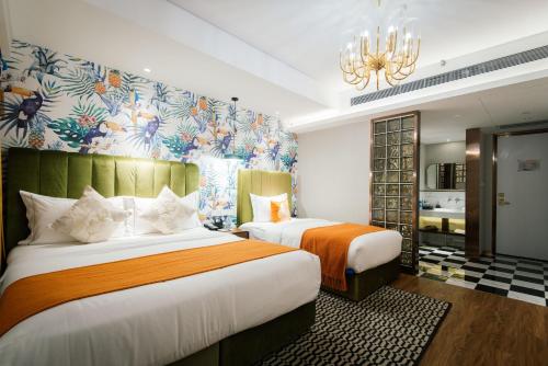 Ein Bett oder Betten in einem Zimmer der Unterkunft Feeling Parent-Child Family Hotel Xi'an