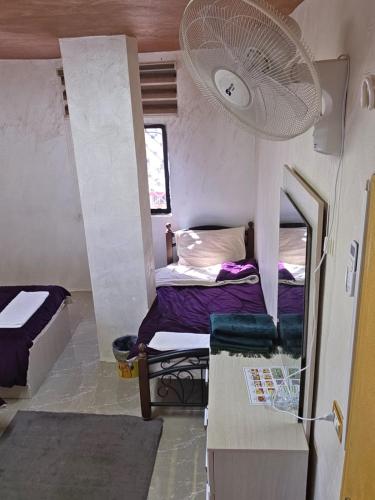 Postel nebo postele na pokoji v ubytování hostel ـ Karak dream