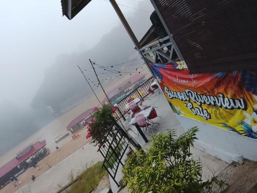 a view of a beach with the ocean in the background at Benteng Taman Negara in Jerantut