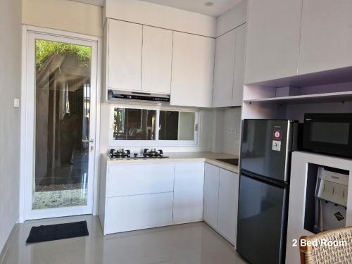 Η κουζίνα ή μικρή κουζίνα στο Matra Apartment
