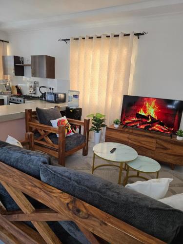 Η κουζίνα ή μικρή κουζίνα στο Charming chalet Diani