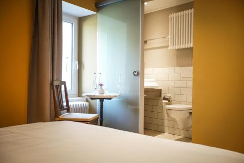 Postel nebo postele na pokoji v ubytování B&B Zum Schleif