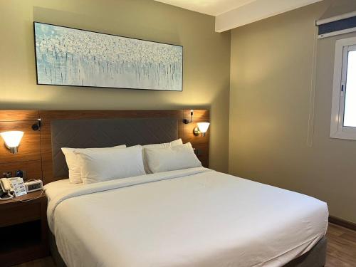 Platinum Hotelにあるベッド