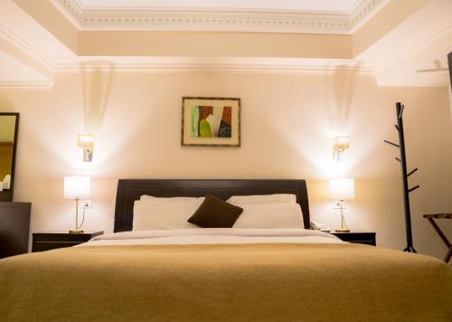 Ένα ή περισσότερα κρεβάτια σε δωμάτιο στο Hotel Royal Marshal