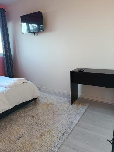 Chambre privée cocooningにあるベッド