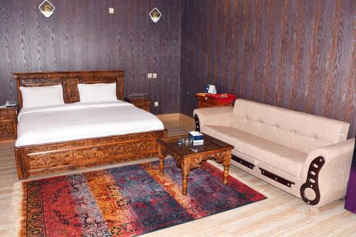 Cama o camas de una habitación en Hotel Pearl Regency