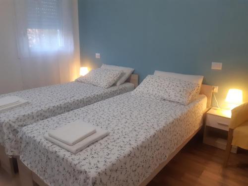 Кровать или кровати в номере Casa Patavina