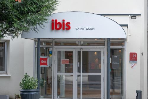 サン・トゥアンにあるibis Paris Nord Porte de Saint Ouenの建物の正面にあるUPSの看板