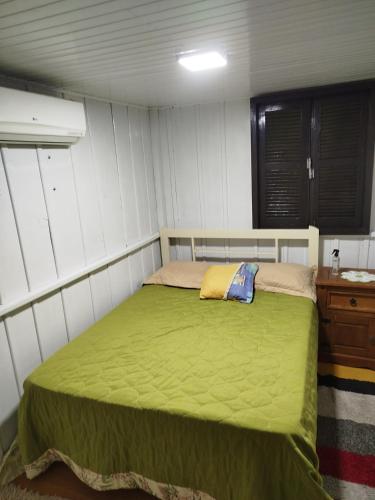 Postel nebo postele na pokoji v ubytování Bella montanha pousada e campig