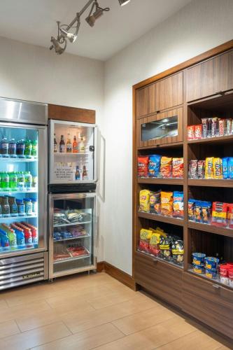 a room with an open refrigerator and lots of food at Fairfield Inn & Suites by Marriott Towanda Wysox in Towanda