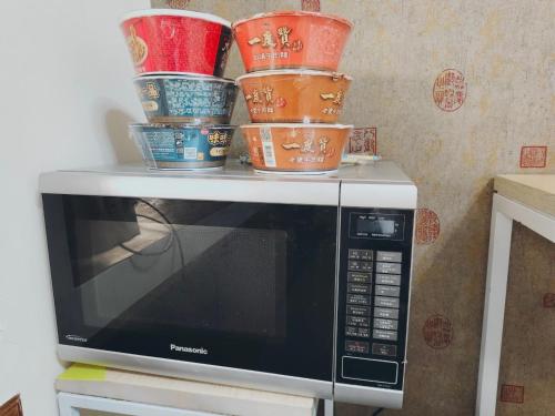 Η κουζίνα ή μικρή κουζίνα στο 寵物友善 漫步森活 九樺落羽松民宿