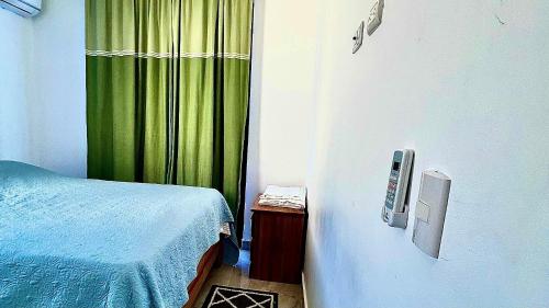 Postel nebo postele na pokoji v ubytování habitacion a 100 pasos de la playa