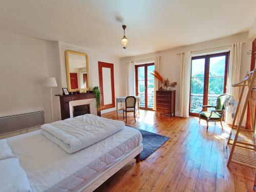 Ένα ή περισσότερα κρεβάτια σε δωμάτιο στο le Pyrénéen, T2, wifi, Luchon centre