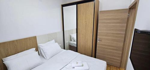 Кровать или кровати в номере Apartman Masa Spa&Wellness