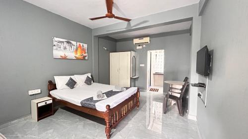 Postel nebo postele na pokoji v ubytování Jackson's Beach House Calangute