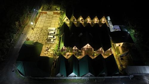 an aerial view of a building at night at Kaliningrat Cottage 2 in Pronojiwo