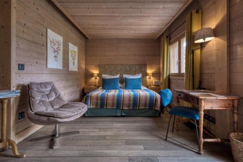 Postel nebo postele na pokoji v ubytování Flocons de Sel - Relais & Chateaux