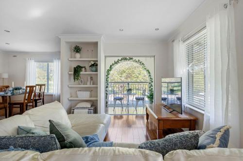 a living room with a couch and a table at 10/17 Richardson Street, South Perth in Perth
