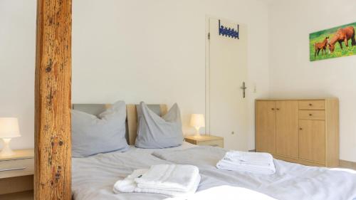 Postel nebo postele na pokoji v ubytování Immensee App F