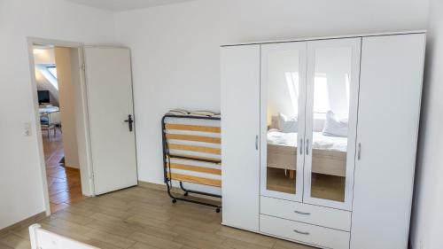 Postel nebo postele na pokoji v ubytování Immensee App F