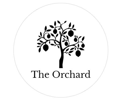 a tree with the orchard black and white logo at The Orchard Addo in Addo
