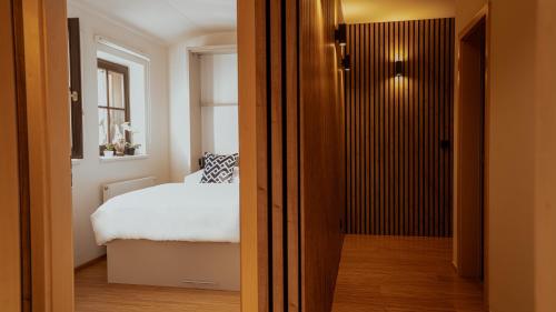 Ένα ή περισσότερα κρεβάτια σε δωμάτιο στο Savoy Loft Apartment