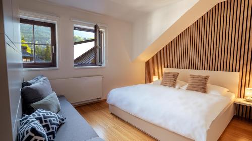 Ένα ή περισσότερα κρεβάτια σε δωμάτιο στο Savoy Loft Apartment