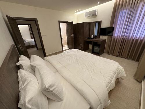 Midtown Lweibdeh Hostelにあるベッド