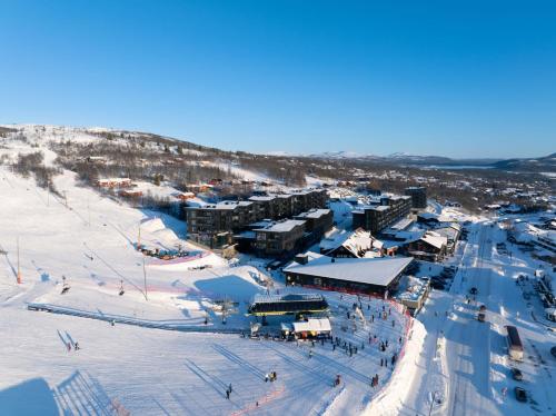an aerial view of a ski resort in the snow at Riddergaarden Mountain Lodge, Beitostølen in Beitostøl
