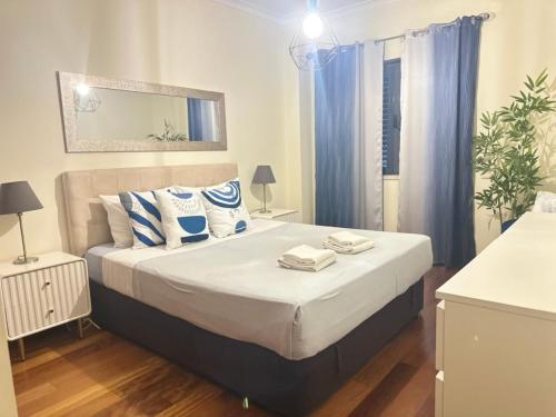 Ένα ή περισσότερα κρεβάτια σε δωμάτιο στο To Be Apartments