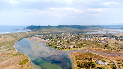 an aerial view of a town next to the water at Ria's Rest Self Catering Flatlet in Sedgefield