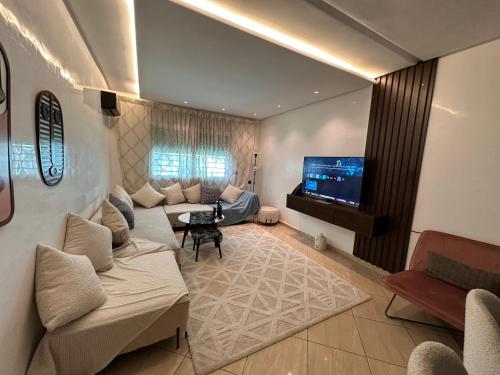 Posezení v ubytování Furnished Apartment High Standing Quiet and Secure