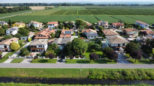an aerial view of a suburb with houses at La Casa delle Magnolie in San Canzian dʼlsonzo