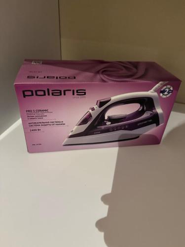 a purple computer mouse sitting on top of a box at Relaxing 2 beds Apartment, Quiet & Comfortable in Chişinău