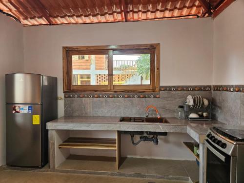Dapur atau dapur kecil di Cabaña junto al Mar