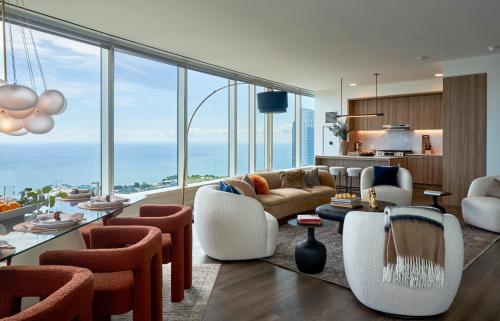 a living room with a view of the ocean at Lux Apts with Lake Views and Top Amenities in Chicago