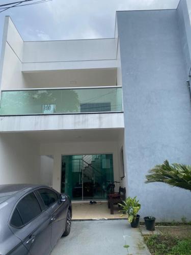 a car parked in front of a house at Casa em condomínio próximo a COP 30 in Belém