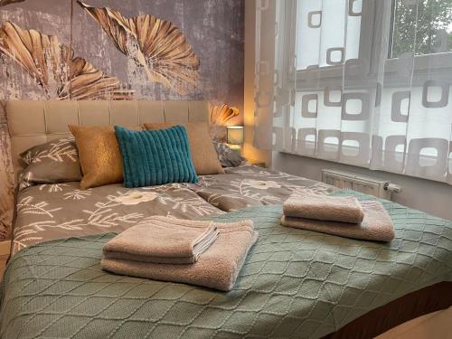 Postel nebo postele na pokoji v ubytování Apartament - jak w domu - 130m2 z Tarasem i ogródkiem