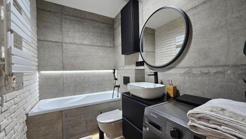 Ένα μπάνιο στο Apartamenty FIGARETTI